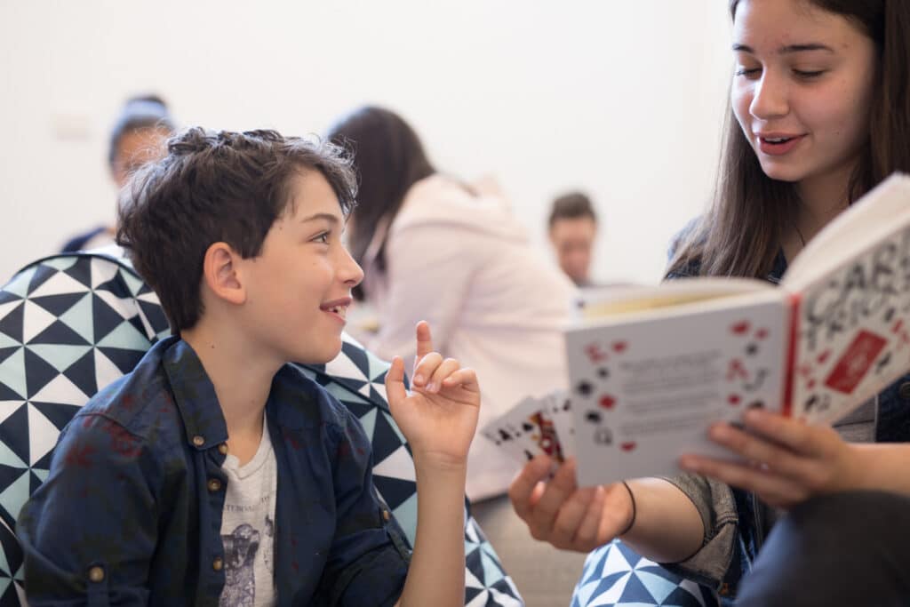 Two Students Reading a Book