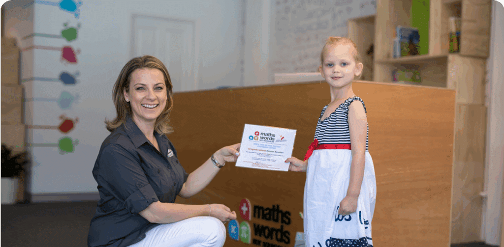 Principal Sia Goutzas Presenting Certificate to Girl