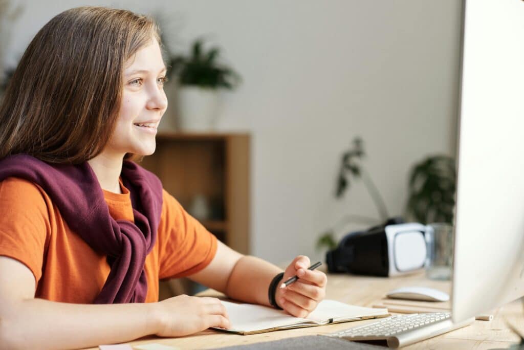 Young Girl Learning on Computer
