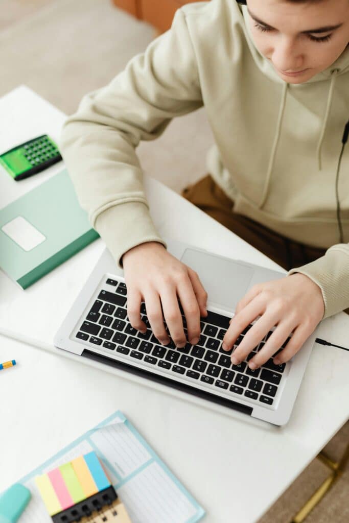 Young Boy Learning on Computer